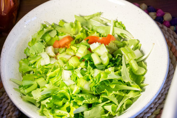 plate of mixed salad, with tomatoes