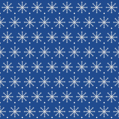 Dotted snowflake pattern. Seamless vector winter background