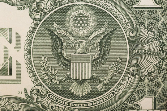 A One Dollar Bill Close Up, Showing The Eagle On The Great Seal Of The United States