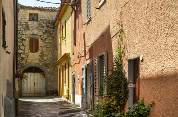 Fototapeta na wymiar typical alley in italian valley