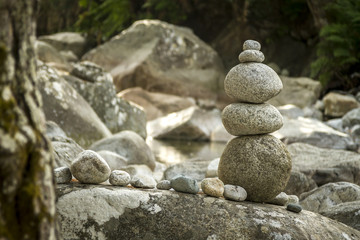 Fototapeta na wymiar balanced stones in riverbed