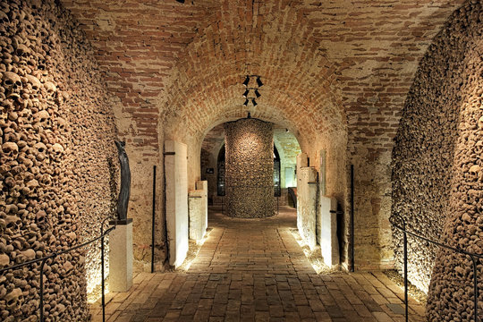 Interior of the underground ossuary under the Church of St. James in Brno, Czech Republic. The ossuary holds the remains of over 50 thousand people which makes it the second-largest ossuary in Europe.