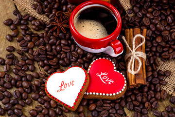 Cup of black tea and heart shaped cookies, for valentine's day