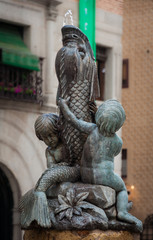 Sculpture of children with a fish, Fountain of the Lions, Segovia, Spain