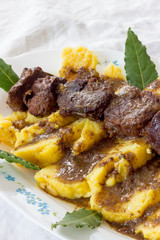 Polenta with wild boar stew