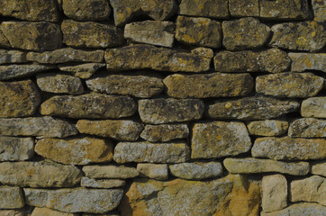 Honey coloured Cotswold dry stone wall