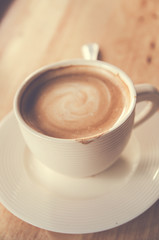 cup of coffee on table in cafe