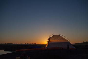 Fototapeta na wymiar camping tent in sunrise