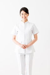 young asian nurse isolated on white background