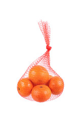 orange in red net isolated on white