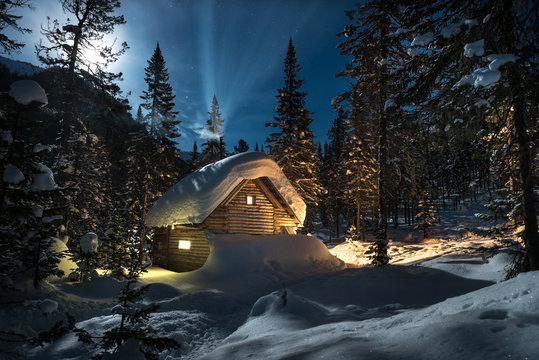 Small cottage in a beautiful snow forest at moon night