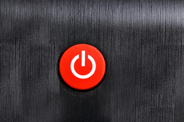 Red  power button on graphite texture (Power ON)