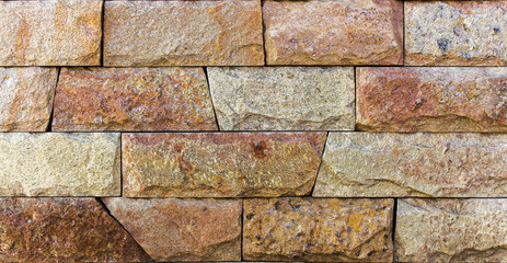Orange facing stone, slate, sandstone and travertine marble