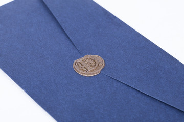 Mail envelope or letter sealed with wax seal stamp on white background