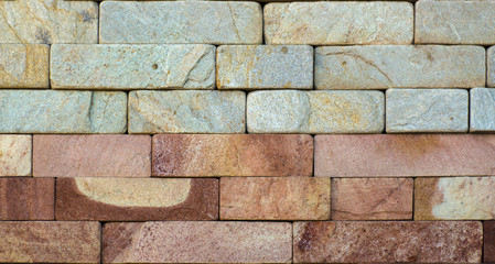 multicolored facing stone, slate, sandstone and travertine marble