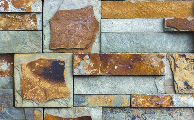 multicolored facing stone, slate, sandstone and travertine marble