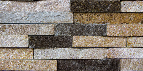 multicolored facing stone, slate, sandstone and travertine marble