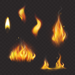 Set of realistic flame tongues isolated on a dark background.