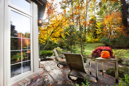 Fall Afternoon Sunlight On A Patio And Lawn