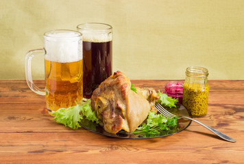 Baked ham hock, condiments, lager beer and dark beer