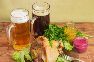 Baked ham hock, condiments, lager beer and dark beer