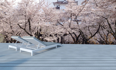 Terrace with wooden chairs on wood floor for vacation winter and sakura flower tree background-3d rendering