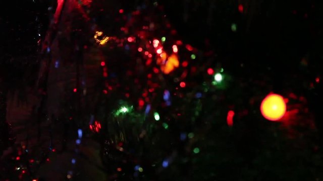 Flickering garlands on a holiday christmas fur-tree
