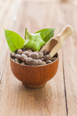 dried capsule seeds fruit of Sacha Inchi peanut in dish