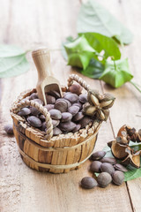 dried capsule seeds fruit of Sacha Inchi peanut in basket