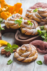 Homemade cinnamon buns with pumpkin