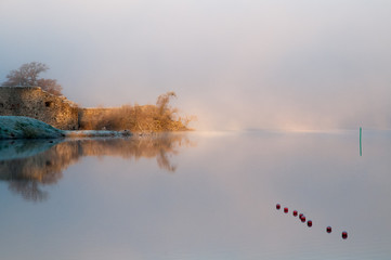 Obraz na płótnie Canvas Kronoberg Castle in early morning fog