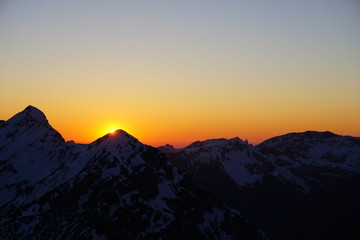 Obraz na płótnie Canvas sunset in the alps (on top of Schellschlicht)