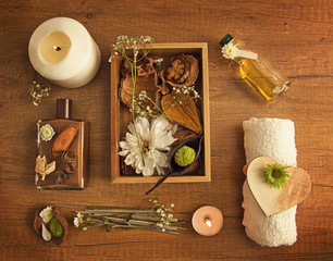 Spa flowers decorations on wooden surface 