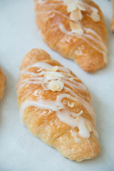  almond croissant on white paper