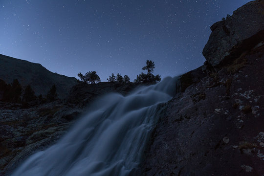 Misty Waterfall Long Exposure Early Night View With Stars On Clear Sky, Altai Mountains Highland Nature Autumn Landscape Photo