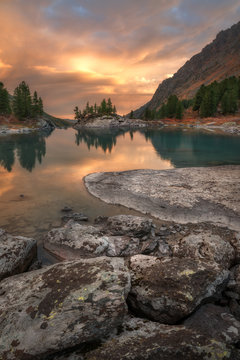 Vertical View Of Sunset Lake With A Rocky Shore, Altai Mountains Highland Nature Autumn Landscape Photo