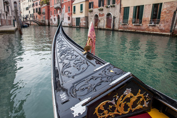 gondola boat stands at pier in Venice © Alena