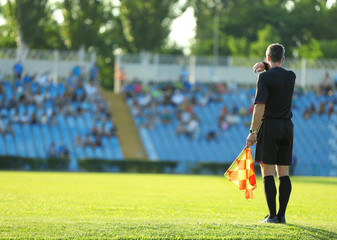 Football match in sunny summer day