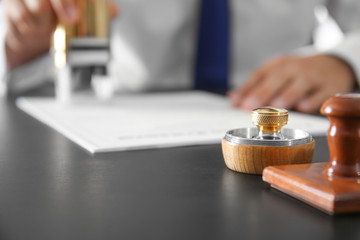 Different stamps on notary public table