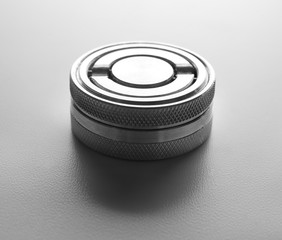 Metal ink pad on grey background