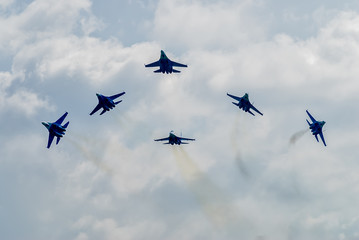Nizhniy Tagil, Russia - July 12. 2008: Team work of russian fighters SU-27 knights. Display of fighting opportunities of equipment with application of aviation means of defeat. RAE exhibition