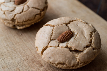 Turkish Almond Cookies / Acibadem Kurabiyesi on wooden surface..