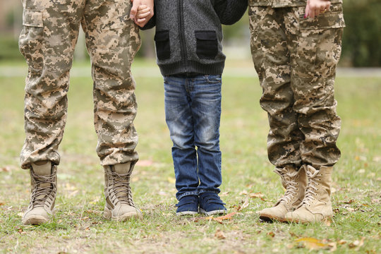 Military family reunited on a sunny day,  closeup