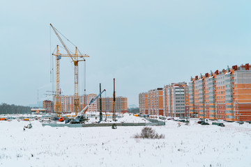 Special machinery at a construction site of a new neighborhood in the city of Cheboksary.