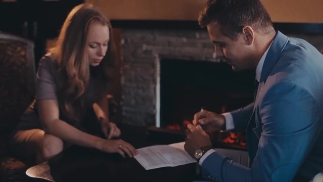 View of a Young attractive employer doing a job interview to a woman
