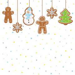 Hanging gingerbread man, tree, snowman and stars cookies isolated on white