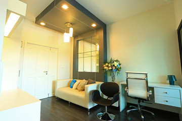 Interior design of room with furniture. Comfortable with bed, sofa, 
chairs, standing lamp, small table