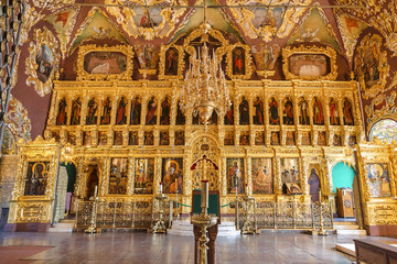 Fototapeta na wymiar The iconostasis in the interior of the church of St. Sergius, Trinity-Sergius Lavra, Sergiev Posad, Russia