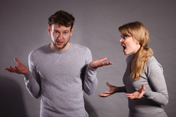 People in fight. Young couple arguing.