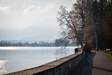 Beautiful afternoon walk in the Thun City Park by the lake, Switzerland, touristic attractions